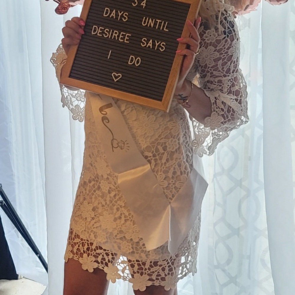 Woman’s white lace dress